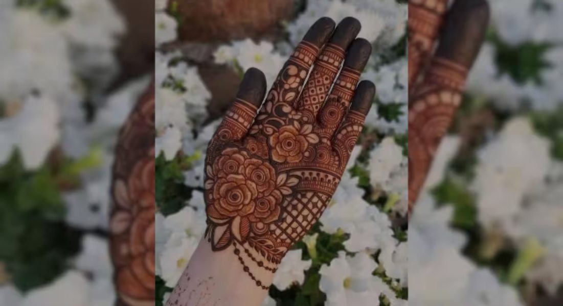 beautiful-henna-design-adorns-hands-featuring-intricate-rose-and-vine-patterns-extending-from-wrists-to-fingertips-complemented-by-solid-color-on-nail-beds-green-outdoor-background-free-photo (1)
