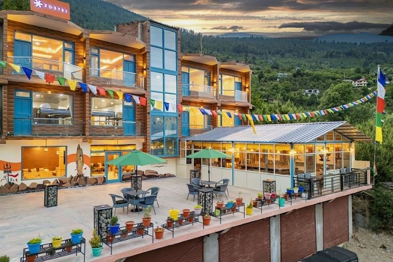 Zostel Kalpa travel stay overlooking lush mountain valleys