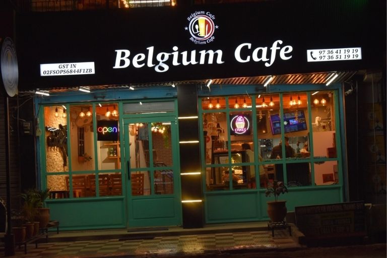 Belgium Cafe Gandhi Chowk menu and food display setup