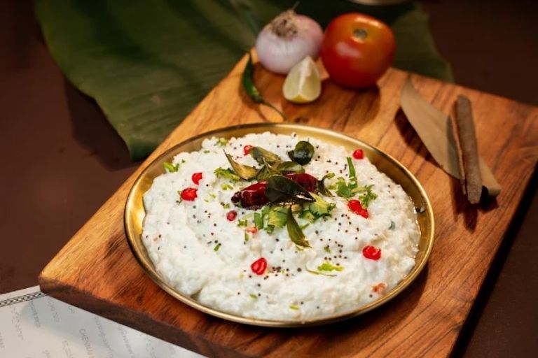 Enjoy traditional cuisine and warm hospitality at Chennai Maratha