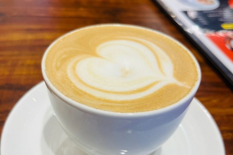 Fresh coffee and pastries at Belgium Cafe Gandhi Chowk