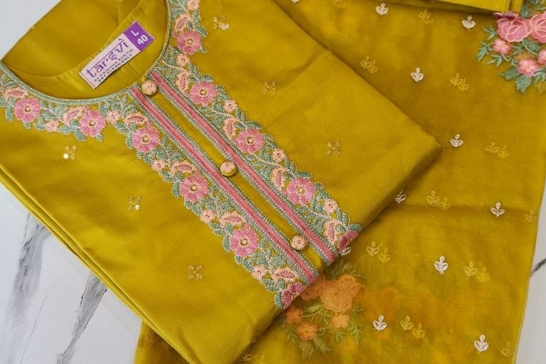 Woman wearing elegant saree from The Naari Collection line