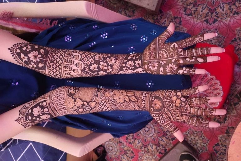 Arjun Mehandi Artist creating stunning henna designs
