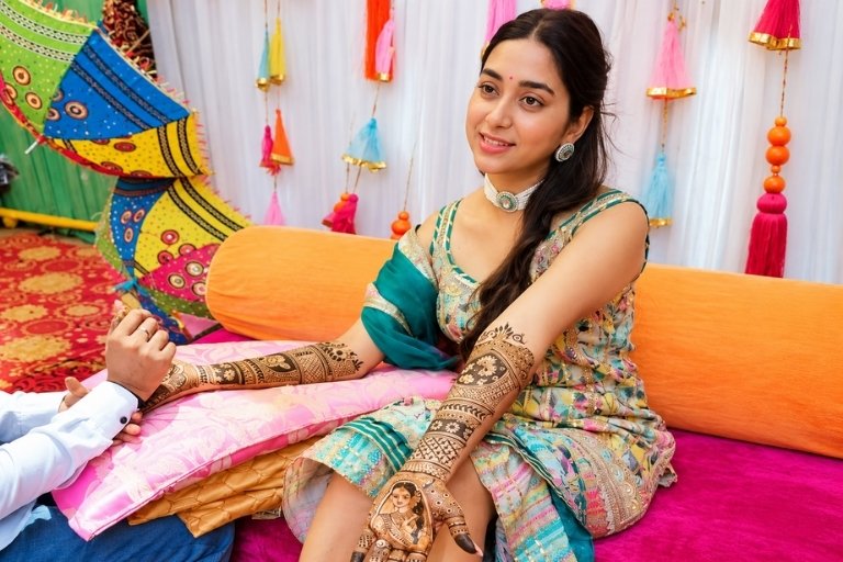 Chander Mehendi Art creating beautiful bridal designs