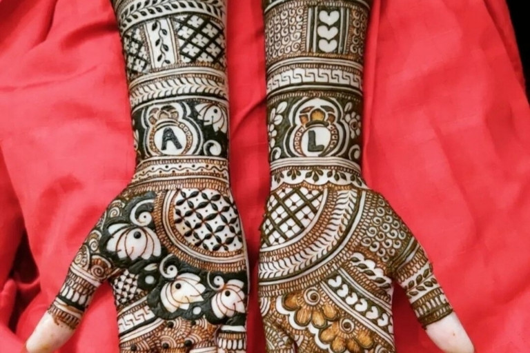 Elegant bridal mehndi designs by Sajan Mehandi Artist