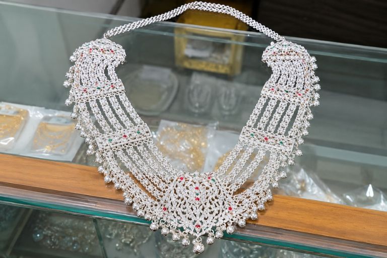 Explore beautiful gold earrings at Surinder Jeweller