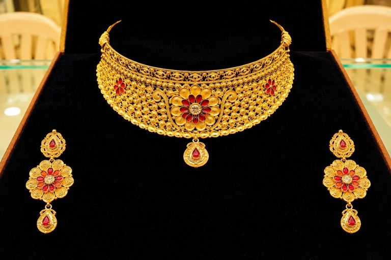 Explore elegant gold ornaments at Mangal Jewellers