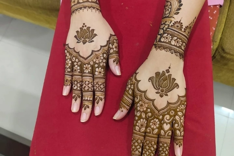 Gajender Mehndi Art creating intricate hand mehndi