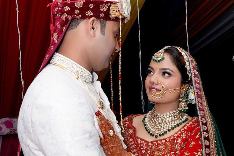 Gautam Digital Photo Studio for elegant bride and groom portraits