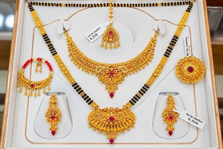 Om Sai Jewellers gold and diamond designs