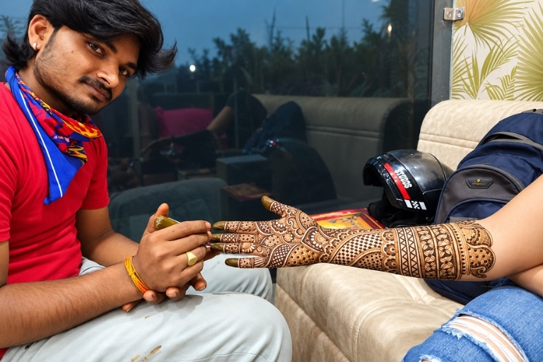 Sajan Mehandi Artist creating stunning hand designs