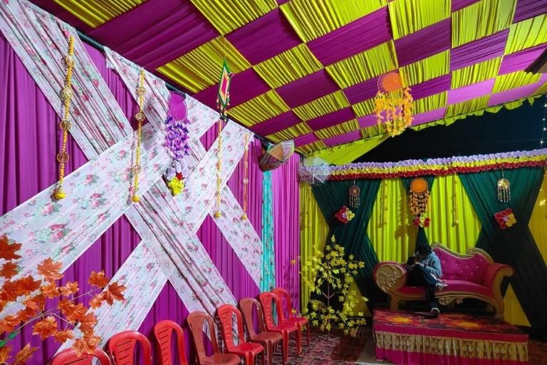 Shanu Tent House providing elegant wedding stage arrangements