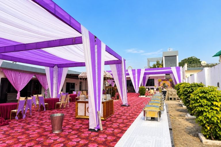 Shivam Tent House delivering tent setups for outdoor wedding events